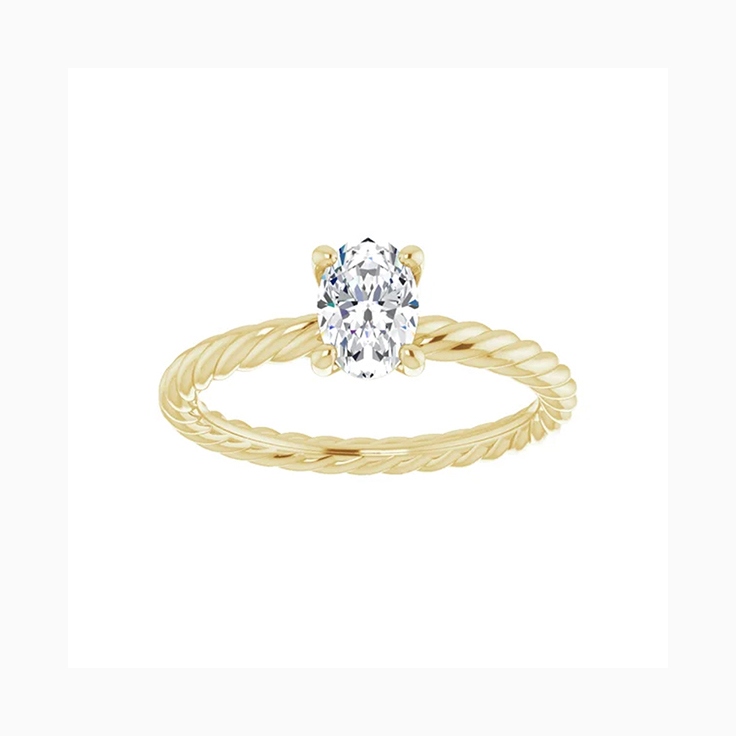 Oval engagement ring with twisted band