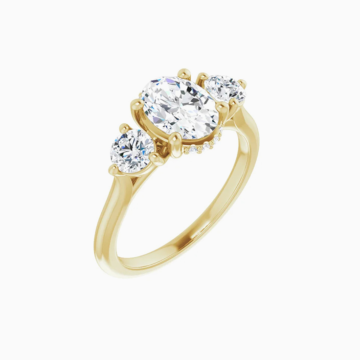 Oval trilogy engagement ring