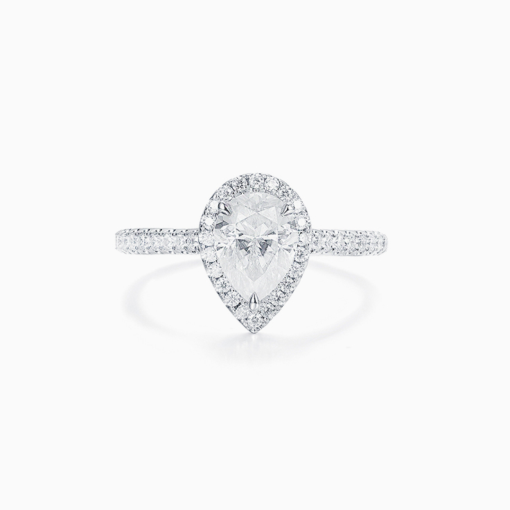 Pear Cut Diamond Engagement ring with a Diamond Halo