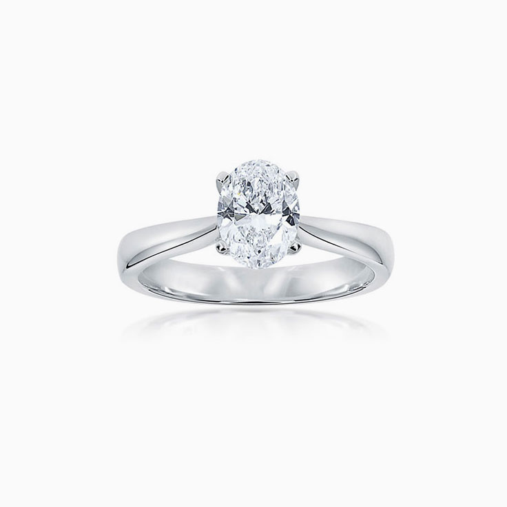 Oval Cut Diamond Engagement ring in four claw plain setting
