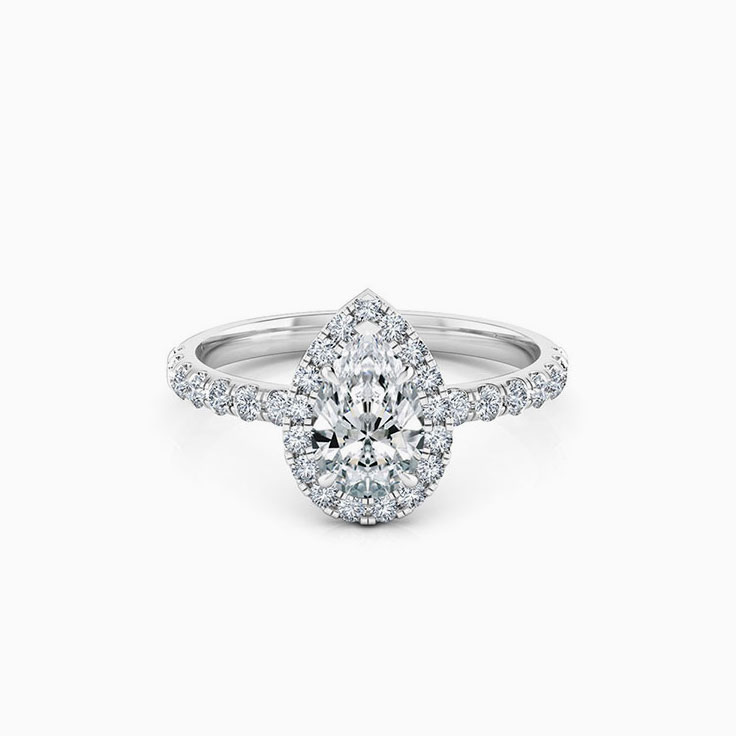 Pear cut diamond engagement ring with halo