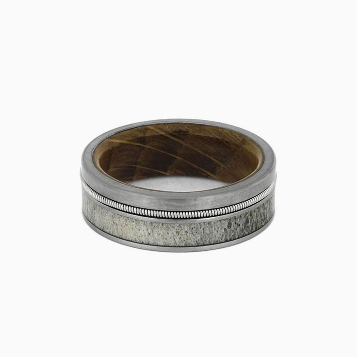 Antler guitar string and whiskey barrel