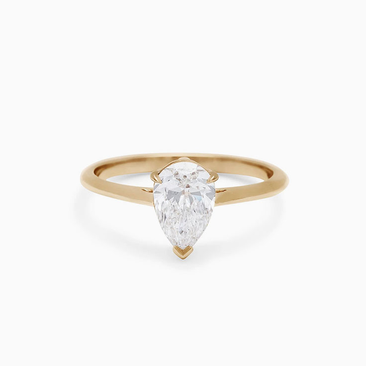 Pear cut solitaire engagement ring