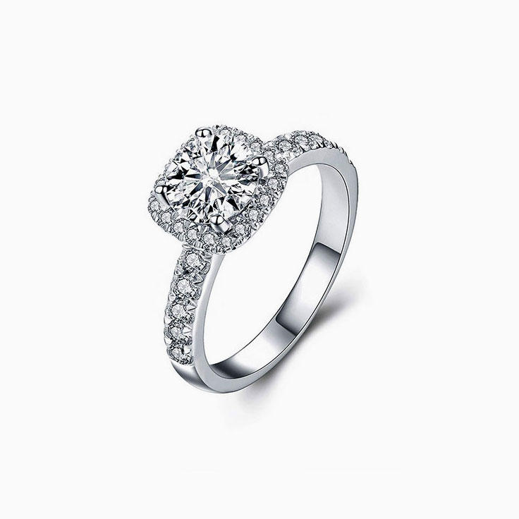 Round Diamond with a Cushion Halo Engagement Ring