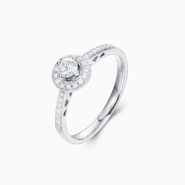 Round Brilliant cut diamond with a pave halo Engagement ring